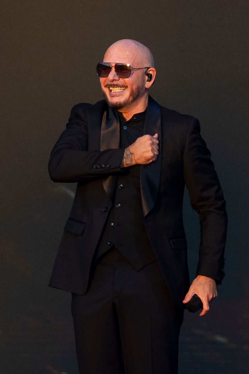Pitbull earns a Guinness World Record after 22,141 fans wore bald caps at BST Hyde Park, where he also performed the biggest concert in the festival's history.