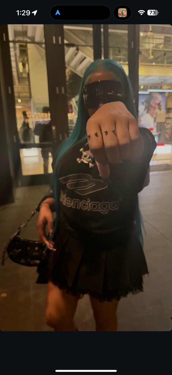 North now has her index and middle finger pierced