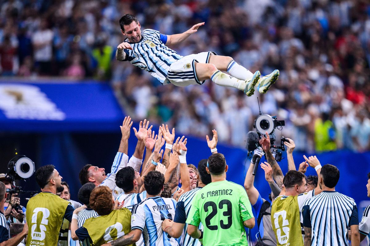 She included one of the pics of Messi being thrown in the air after Argentina vs. Egypt