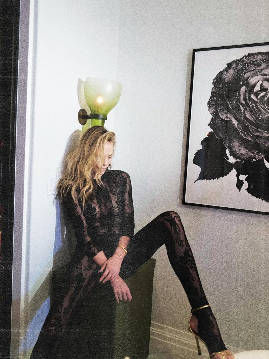 Charlize Theron stuns in a sexy and lacy catsuit