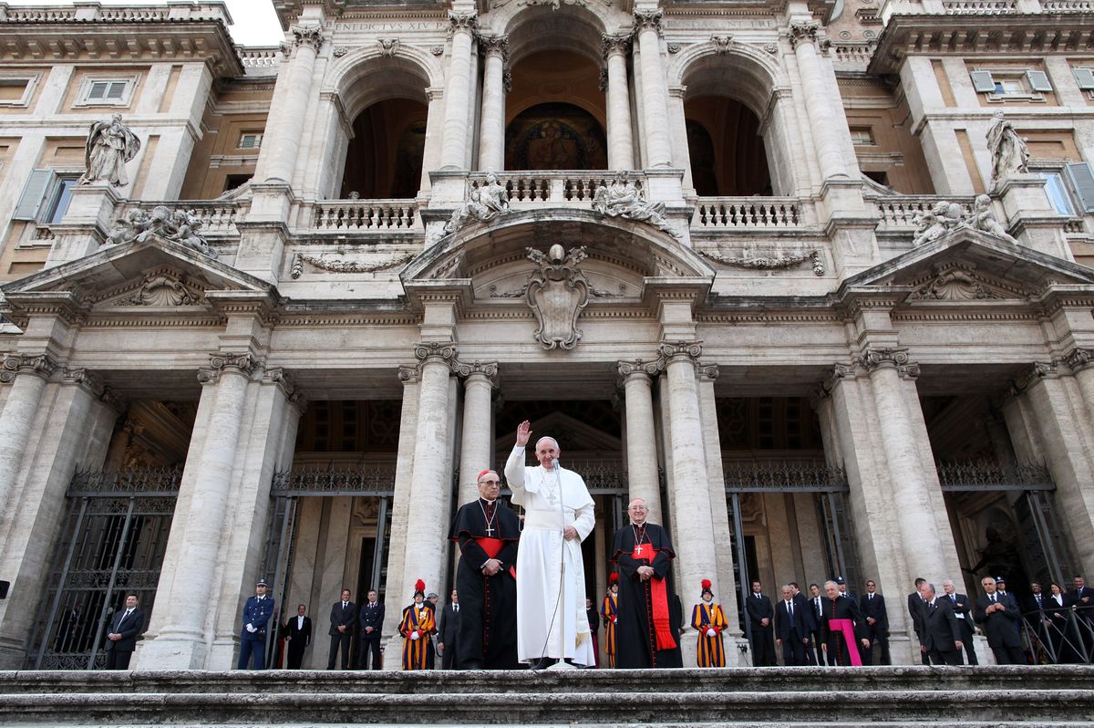 Pope Francis waves to the faithful at the end of the recitation of the Rosary at Basilica di Santa Maria Maggiore on May 4, 2013 in Rome, Ital