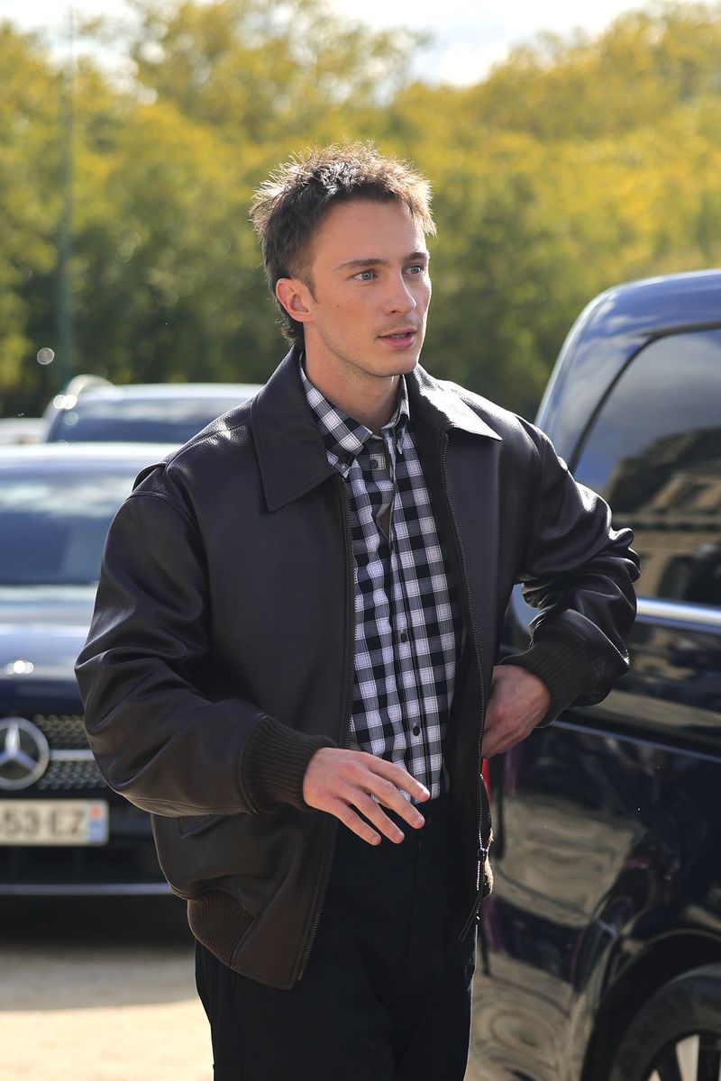 Drew Starkey attends the Loewe Paris Womenswear Spring-Summer 2025 show as part of Paris Fashion Week 