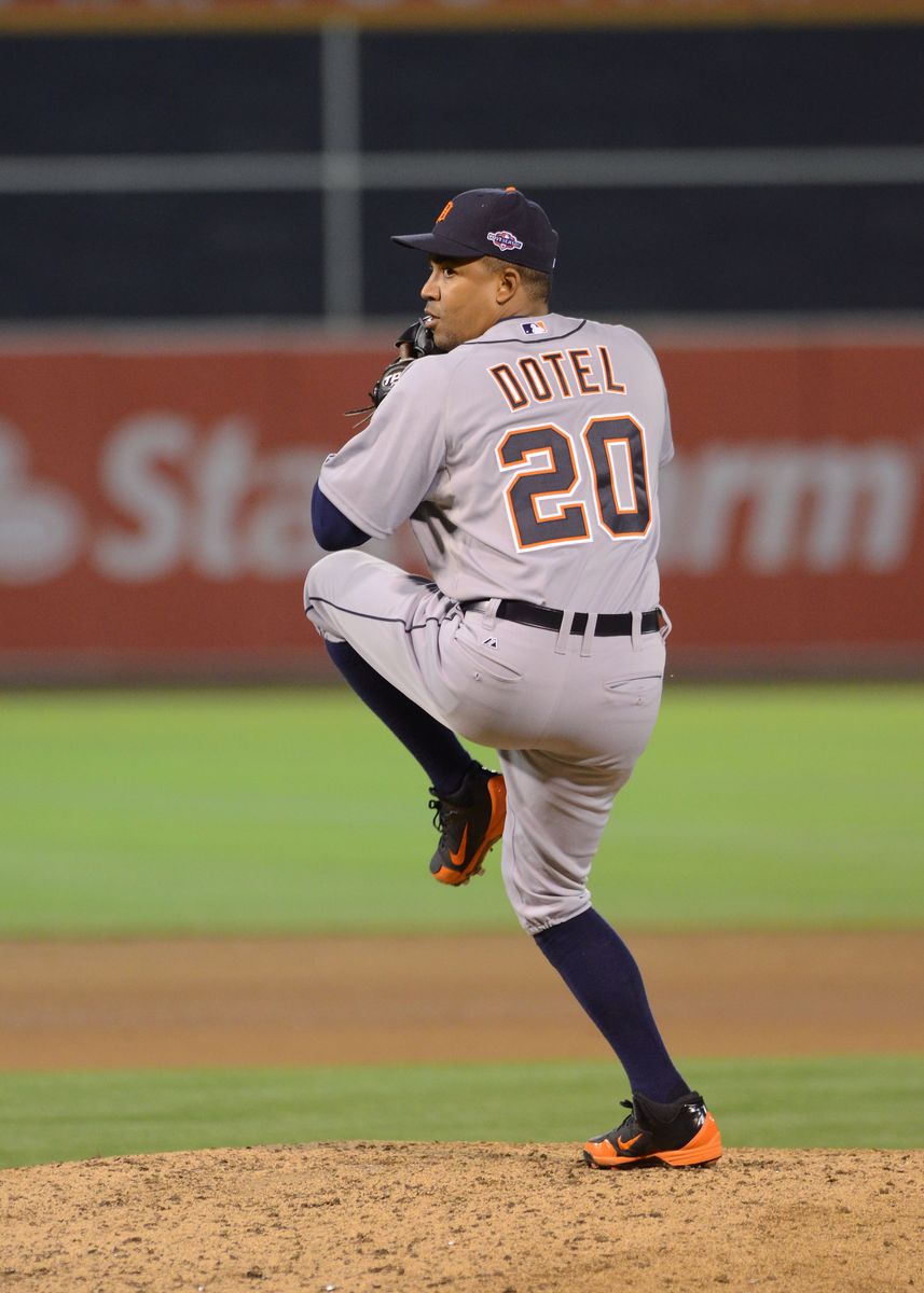 Octavio Dotel #20 of the Detroit Tigers pitches during Game Four of the American League Division Series against the Oakland Athletics at Oakland-Alameda County Coliseum on October 10, 2012 in Oakland, California. The A's defeated the Tigers 4-3.  (Photo by Mark Cunningham/MLB Photos via Getty Images)