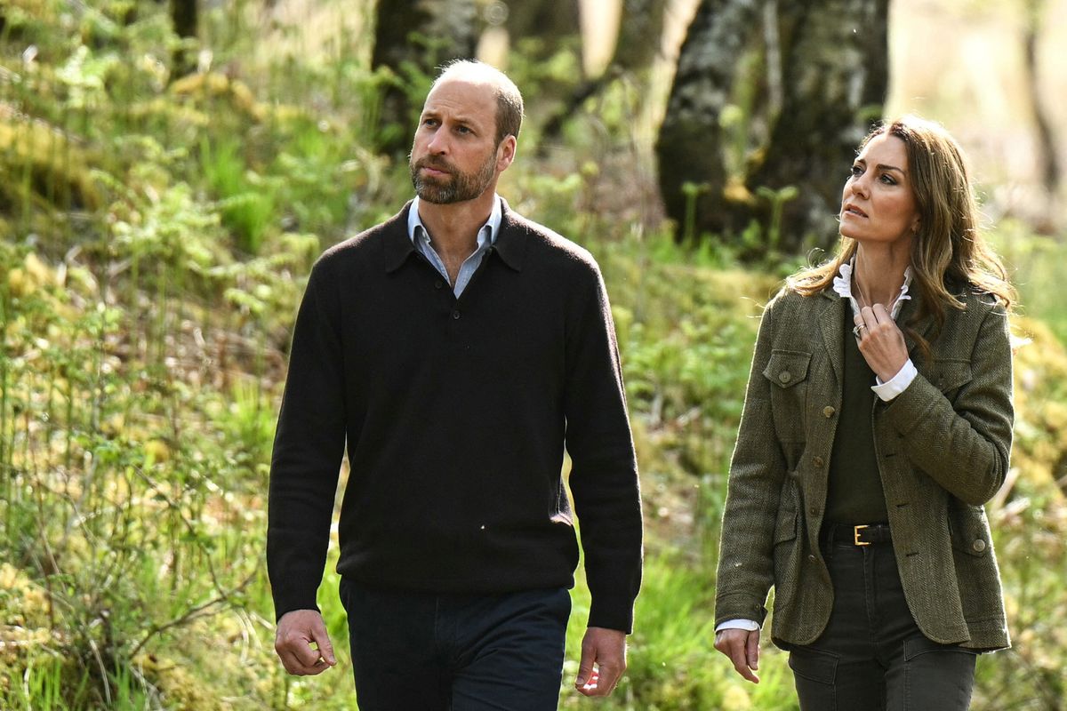 Prince William and Kate Middleton appear unfazed during their Scottish getaway as Harry and Meghan prepare for their U.K. move.