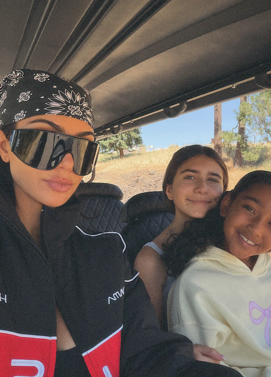Kim Kardashian shared a sweet moment with her family during the lakeside vacation.