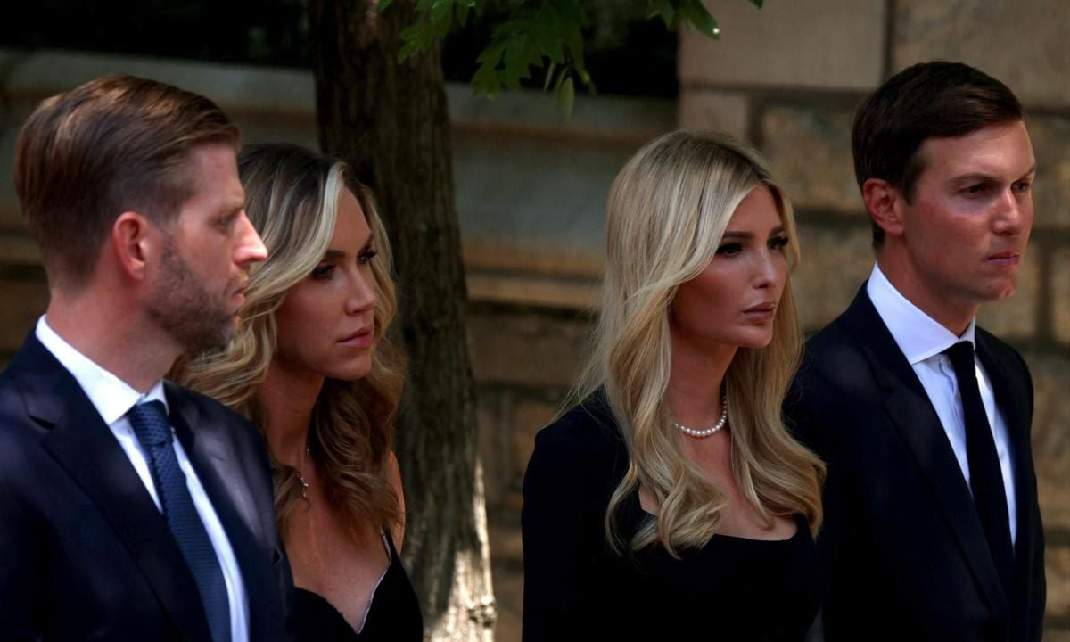 Eric and Lara Trump, who attended with their son Eric Luke and daughter Carolina, were seen next to Ivanka and Jared outside of the church.