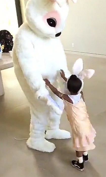 North and her cousins were visited by Kanye and Tyga, dressed as fluffy white rabbits.
<br>Photo: Snapchat/@kimkardashian