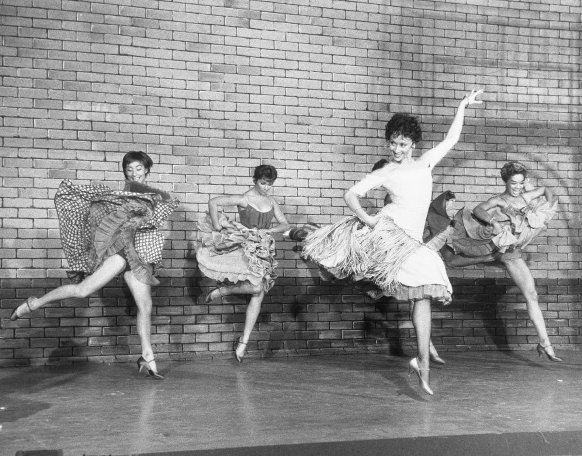 Scene from the Broadway musical "West Side Story," L-R: Lynn Ross, Chita Rivera, and Carmen Guitterez.