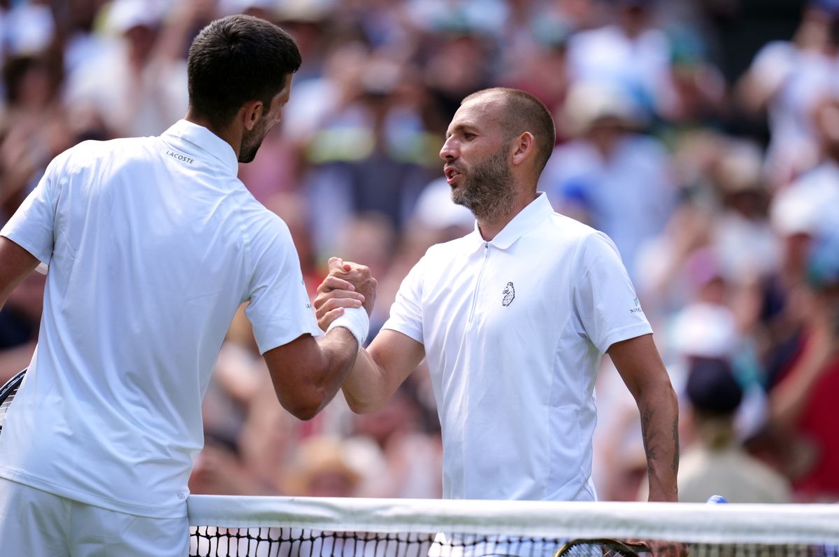 Daniel Evans (right) after his defeat to Novak Djokovic on day four of the 2025 Wimbledon Championships at the All England Lawn Tennis and Croquet Club, London. 