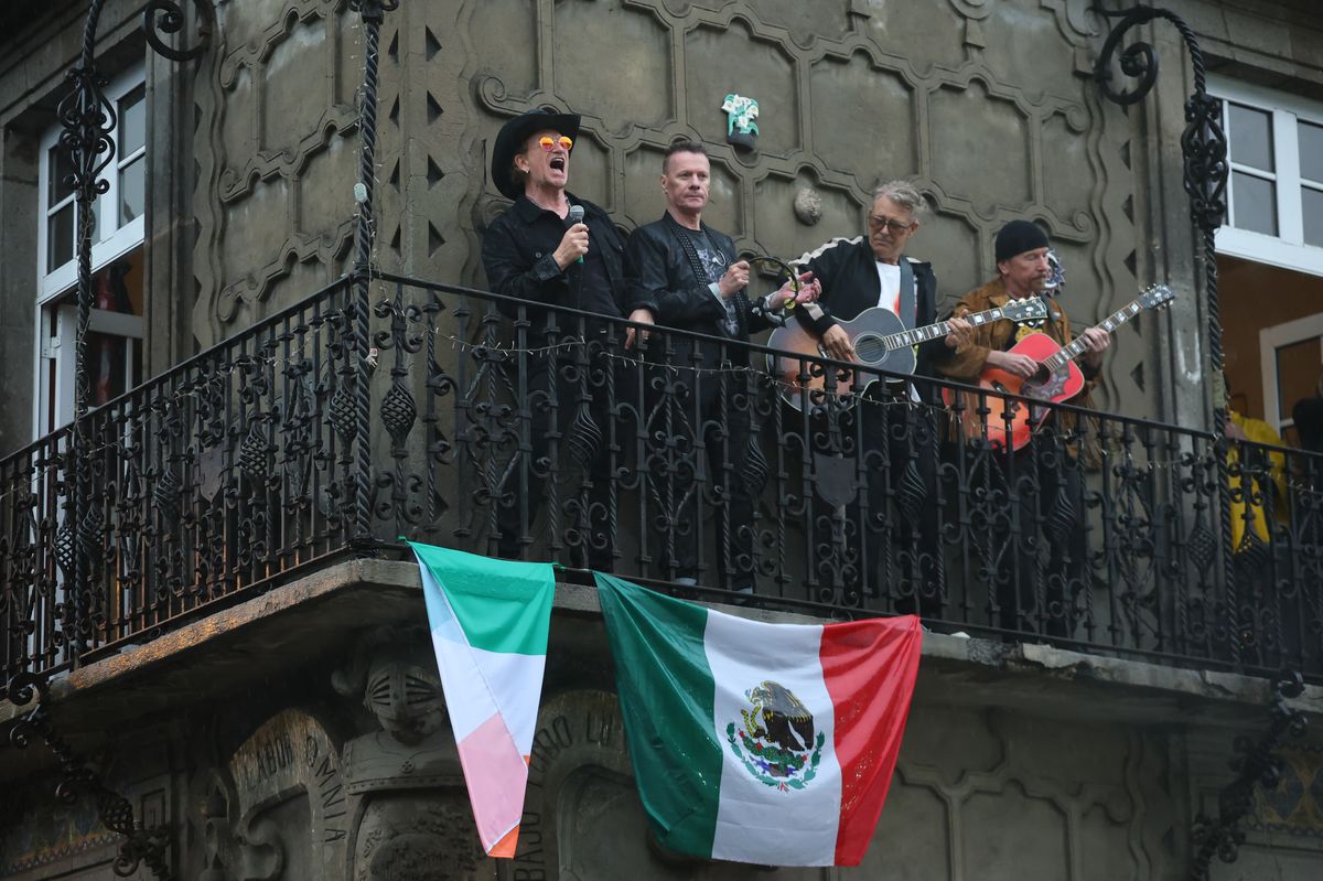 Irish band U2 perform from a balcony for Mexican fans in Mexico City on May 12, 2026 in Mexico City, Mexico.