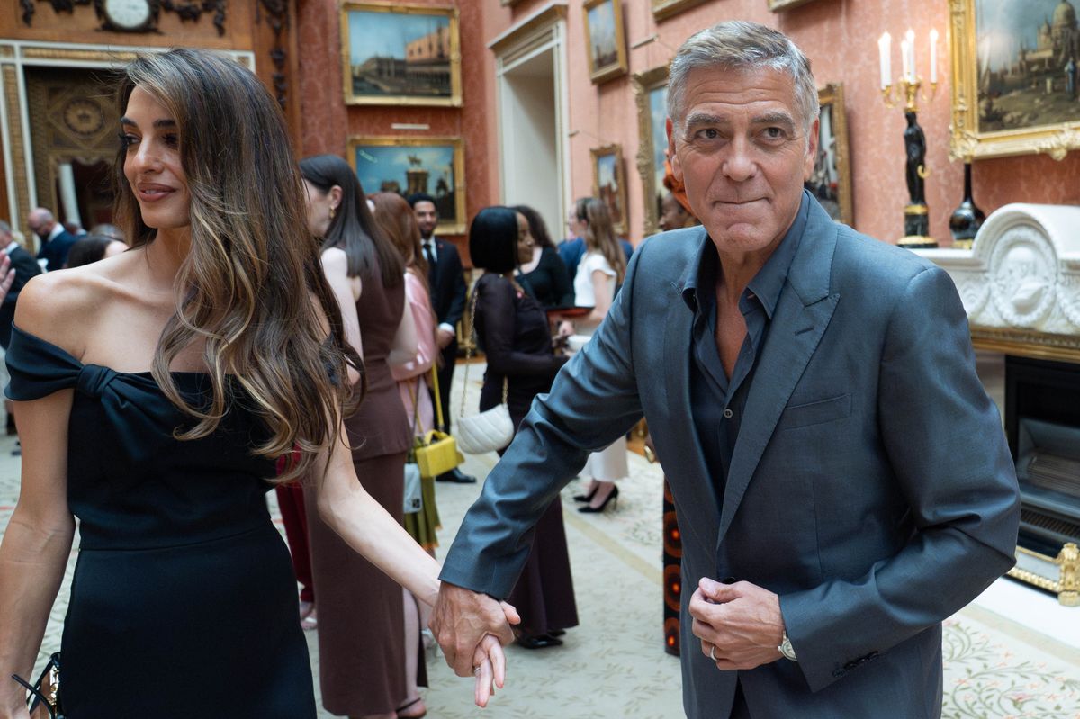 Amal and George Clooney attending a reception for the winners of the King's Trust Awards 2025 at Buckingham Palace, London. Picture date: Wednesday June 25, 2025. (Photo by Stefan Rousseau/PA Images via Getty Images)
