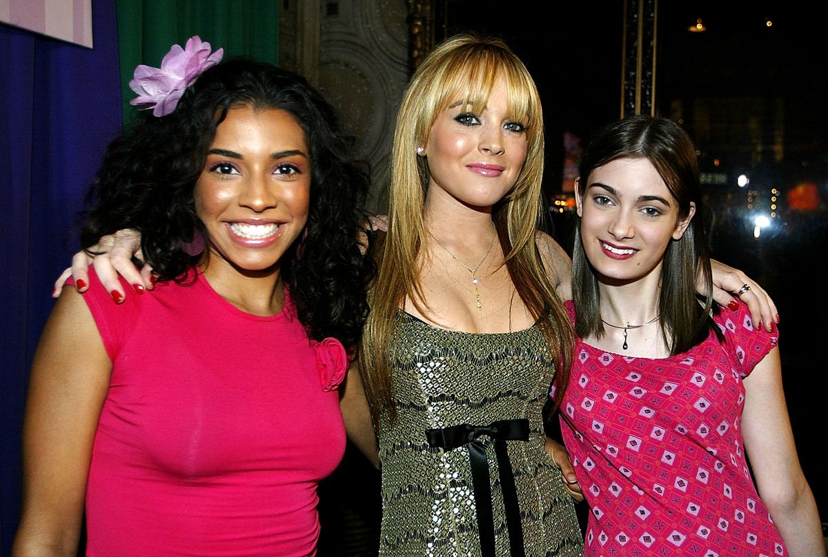 Christina Vida, Lindsay Lohan, and Haley Hudson arrive at the premiere of the Disney film Freaky Friday at the El Capitan theater on August 4, 2003