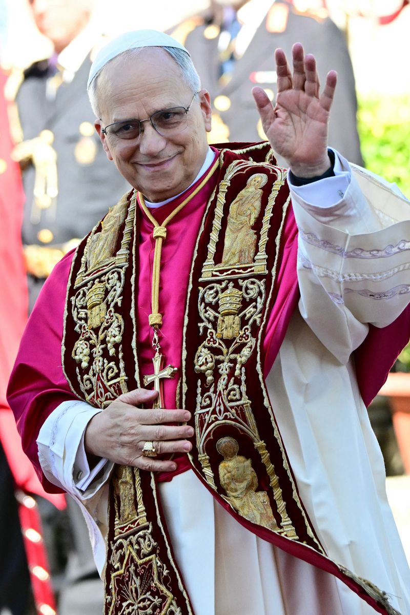 Pope Leo XIV leaves after he received the homage of the Rome's mayor Roberto Gualtieri and the City of Rome at the townhall, on May 25, 2025. (Photo by Alberto PIZZOLI / AFP) (Photo by ALBERTO PIZZOLI/AFP via Getty Images)          