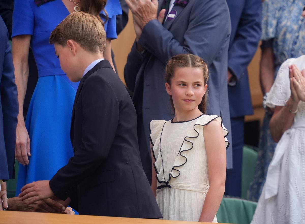 Princess Charlotte with Prince George in the Royal Box on day fourteen of the 2025 Wimbledon Championships at the All England Lawn Tennis and Croquet Club, London. Picture date: Sunday July 13, 2025. (Photo by Adam Davy/PA Images via Getty Images)