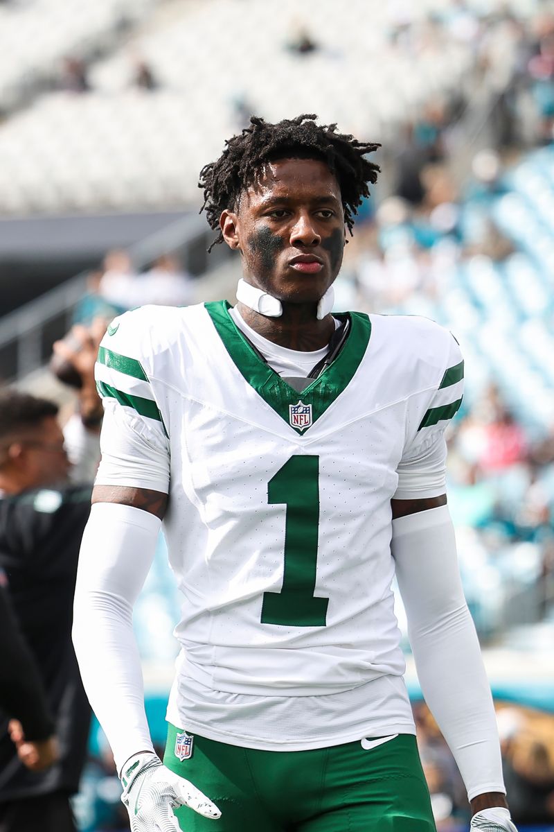 Sauce Gardner #1 of the New York Jets walks off of the field after warming up prior to an NFL football game against the Jacksonville Jaguars at EverBank Stadium on December 15, 2024 in Jacksonville, FL. (Photo by Perry Knotts/Getty Images)