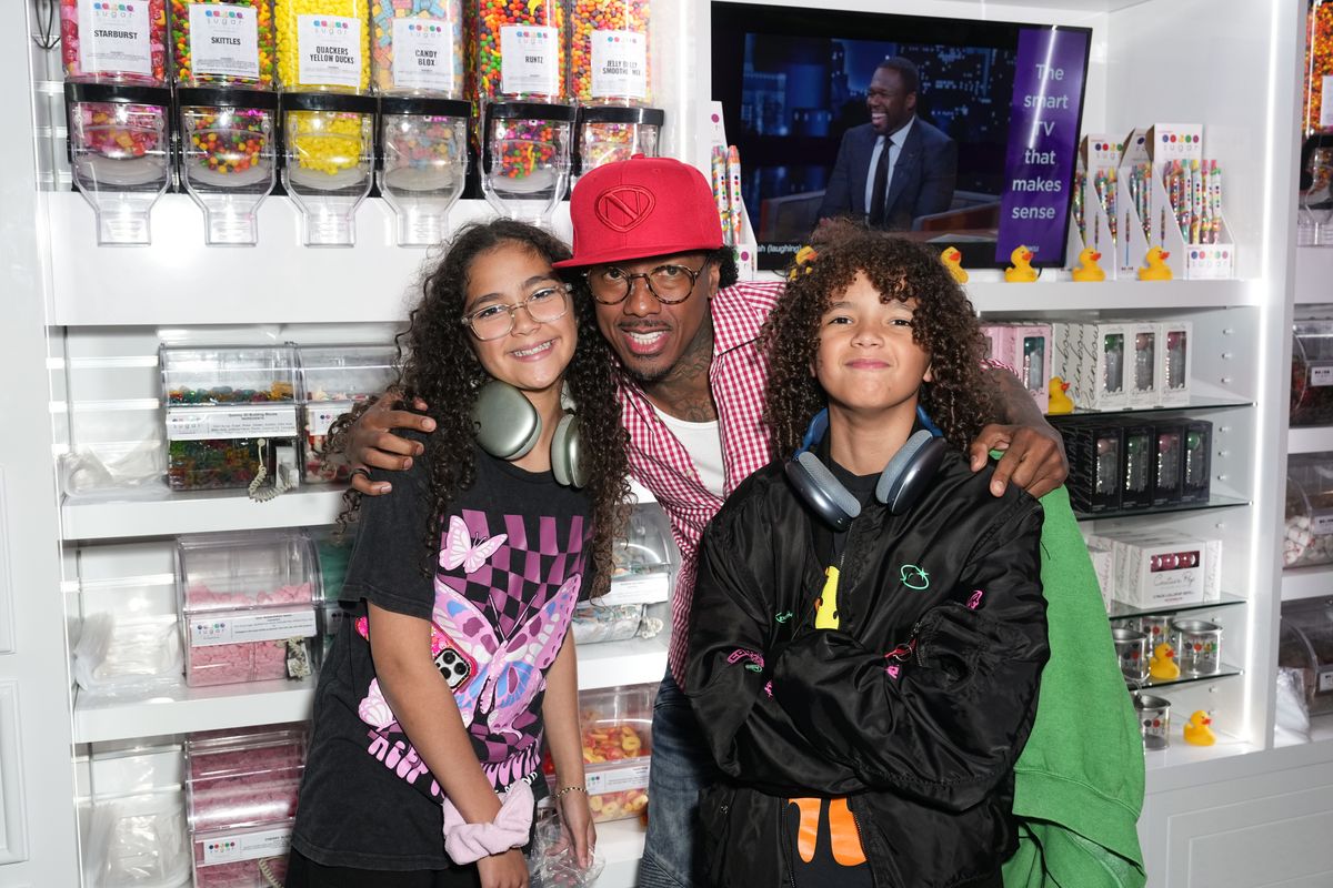 Moroccan Cannon, Nick Cannon and Monroe Cannon attend the Natti Natasha & Nick Cannon host Sugar Factory in Times Square on August 11, 2023 in New York