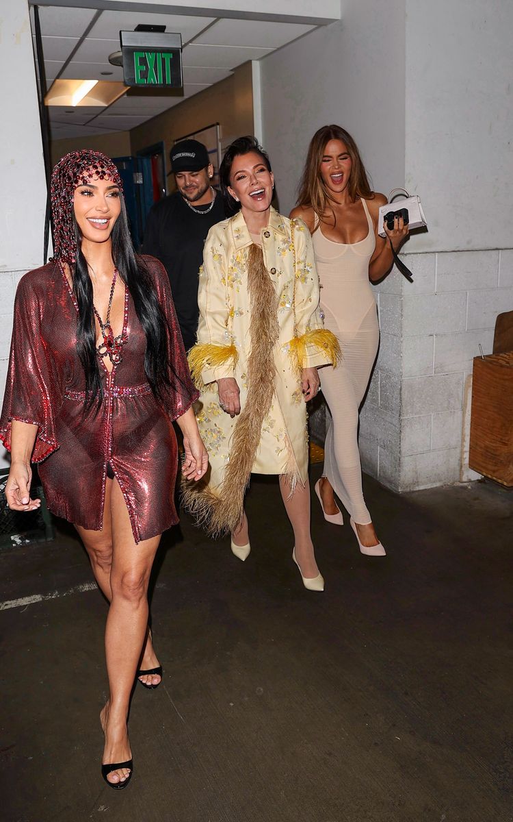 Kim Kardashian stepped out in a dazzling red ensemble alongside her mother, Kris Jenner, brother Rob Kardashian and sister Khloé Kardashian following her birthday festivities.