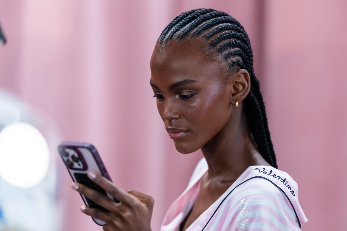 She hit the runway in the brand’s Pink line, rocking a pastel athleisure set—joggers, hoodie, and cap—with her long braids flowing behind her.