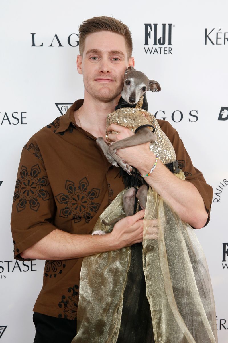 Thomas Shapiro and Tika the Iggy attend The Daily Front Row's 11th Annual Fashion Media Awards