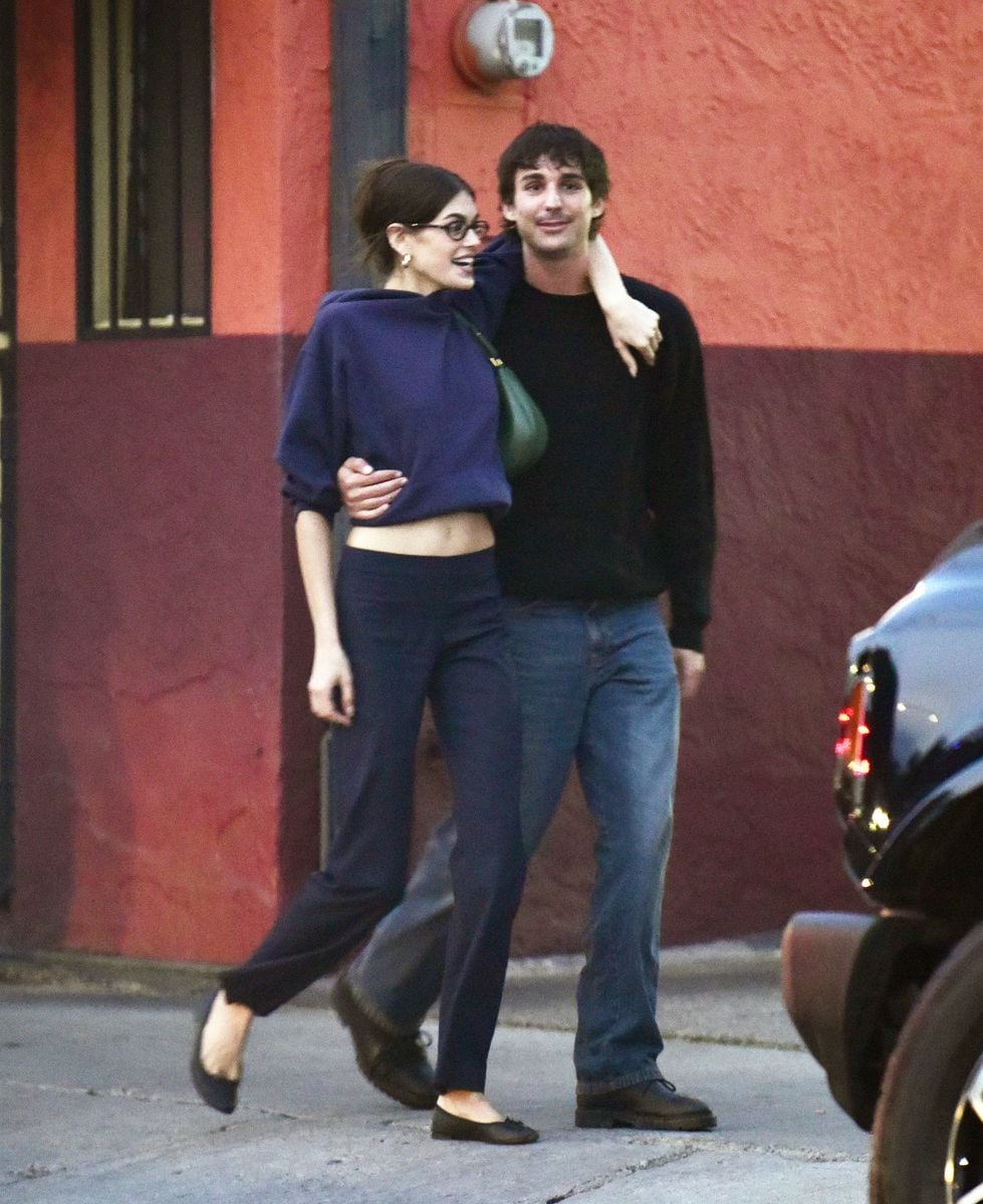  Kaia Gerber steps out arm in arm with her friend Travis Jackson