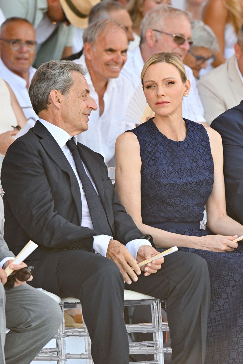 Princess Charlène greets former French President Nicolas Sarkozy as leaders gather for the commemorative ceremony in Nice.
