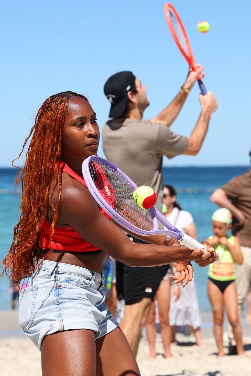Coco Gauff and Taylor Fritz of Team USA play beach tennis with junior players during a Team USA United Cup media opportunity