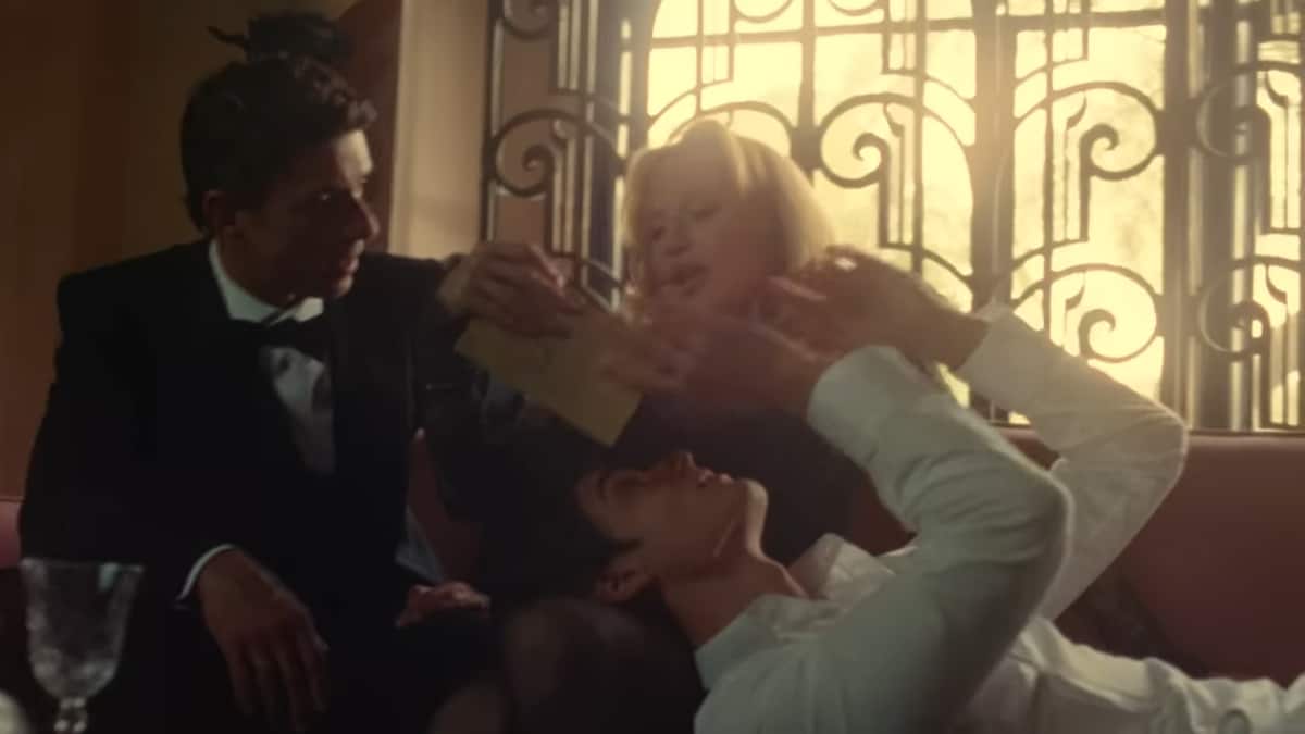 Madonna gets entangled with two guys on her latest Dolce and Gabbana ad