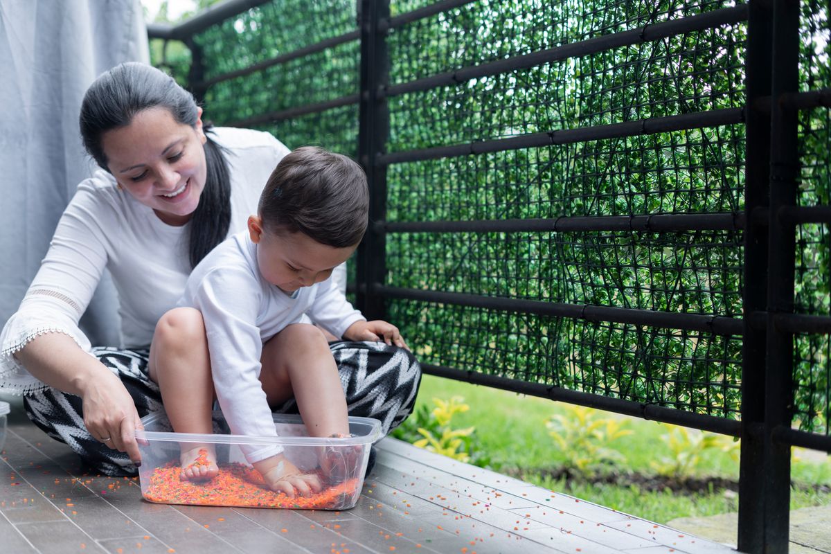 Add scoops, cups, and containers so kids can explore freely