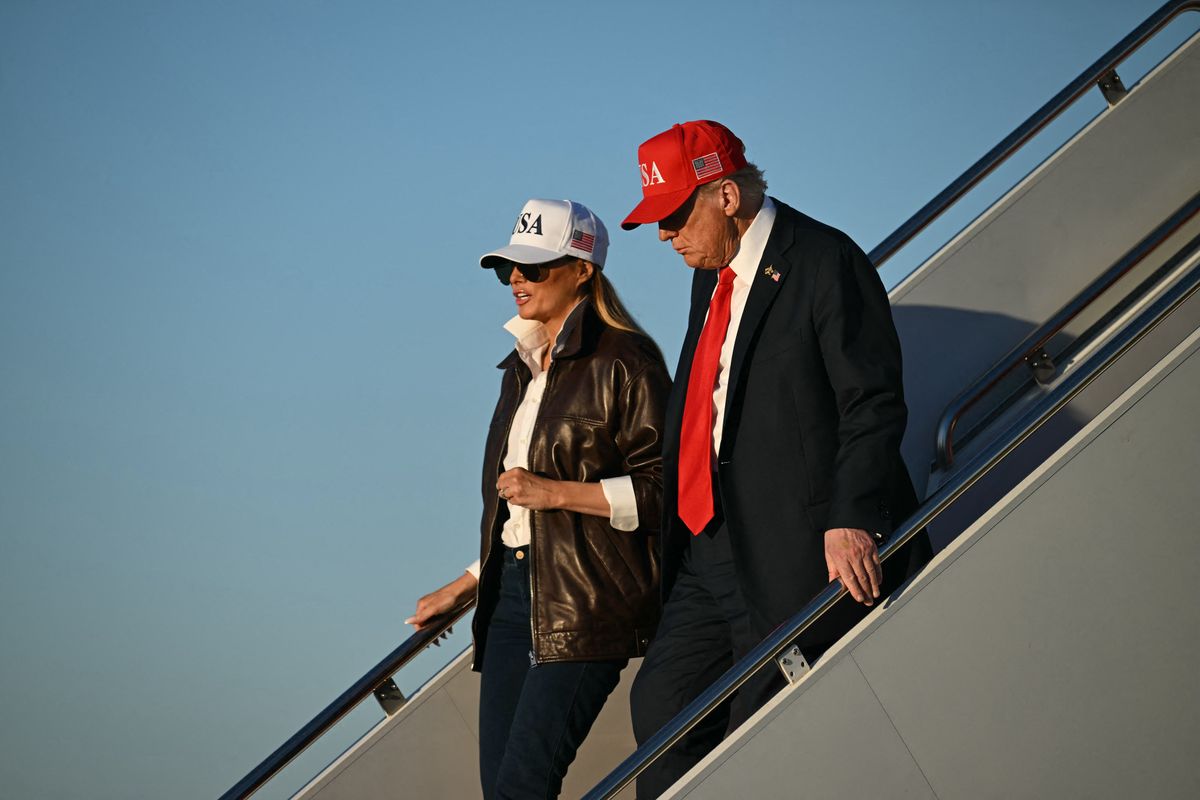 Throughout the day, the Trumps mingled with military personnel, with Melania seen standing close to Donald as they greeted attendees.