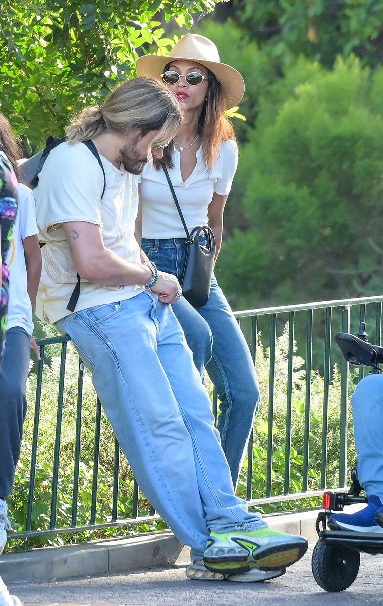 Marco Perego and Zoe Saldana at Disneyland