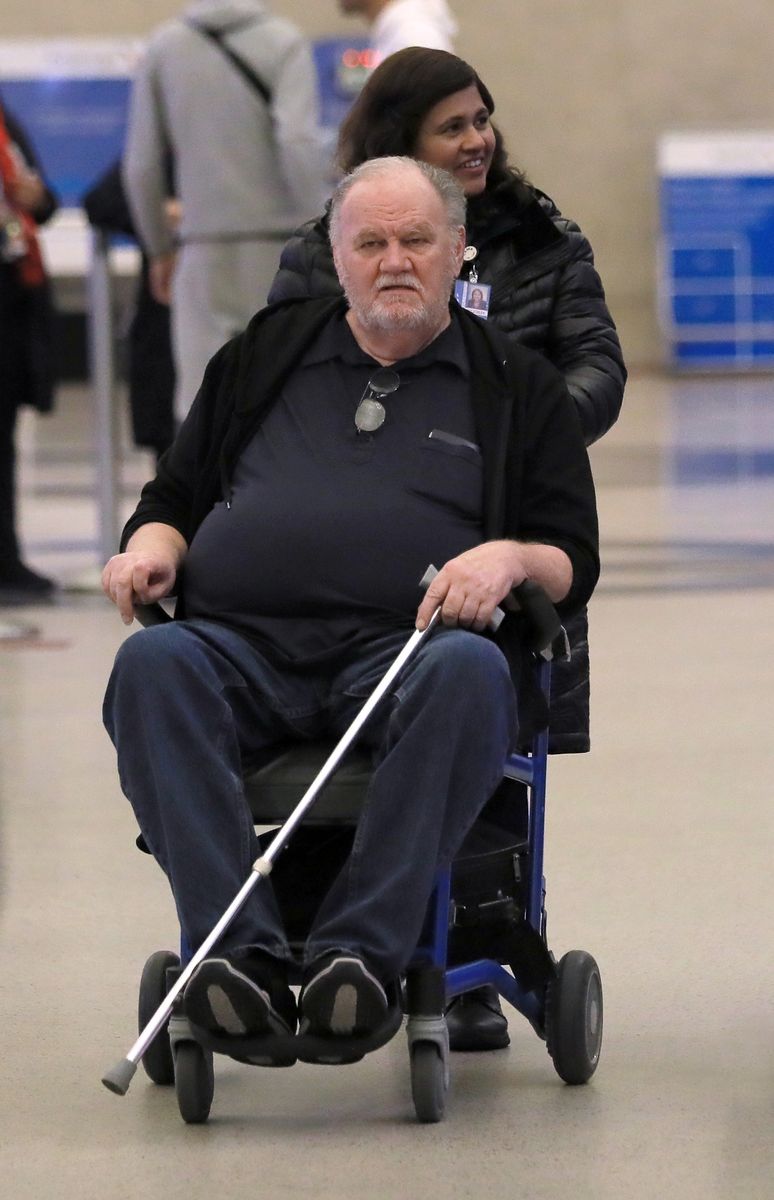 A frail looking Thomas Markle is mum on his daughter, Meghan Markle as he seen in a wheel chair as he catches a flight out of Los Angles with his son, Thomas Jr. on Tuesday.