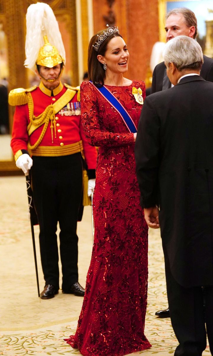 The Princess stunned in a red long-sleeve Jenny Packham gown.