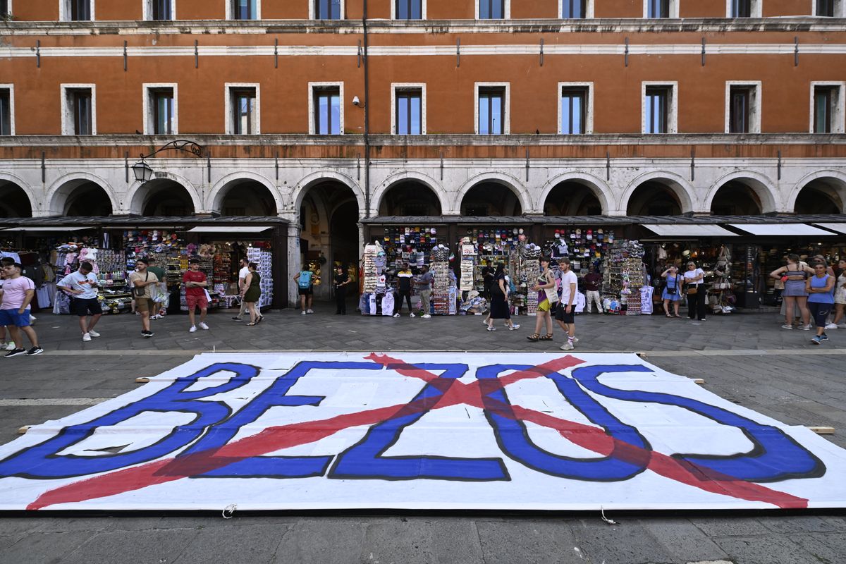 A group of protestors hung a banner on St Mark's bell