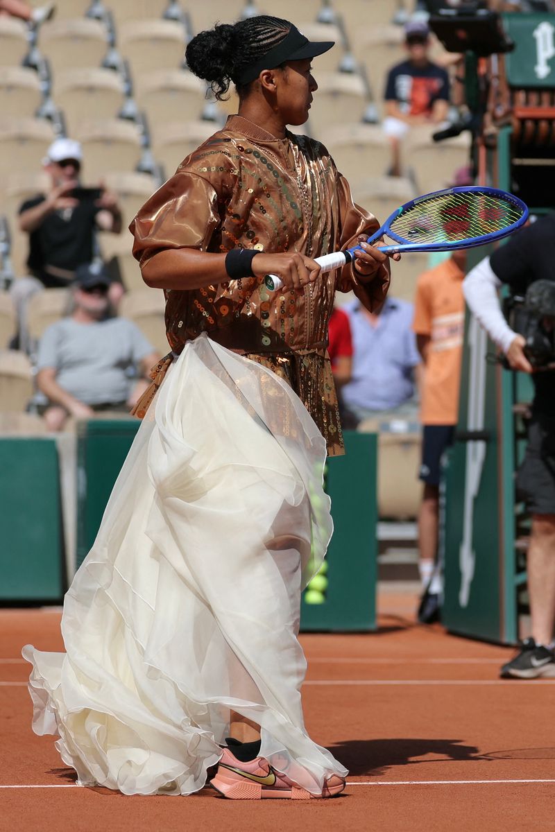 Japan's Naomi Osaka stands prior to her women's singles match against Croatia's Donna Vekic on day 5 of the French Open tennis tournament on Court Simonne-Mathieu at the Roland-Garros Complex in Paris on May 28, 2026. (Photo by Thomas SAMSON / AFP via Getty Images) 