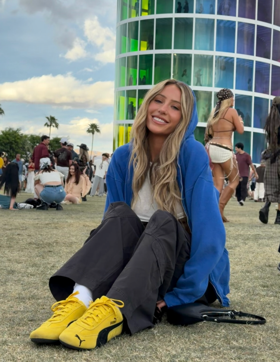 Alix Earle in baggy pants and stylish Speedcat sneakers at Coachella 