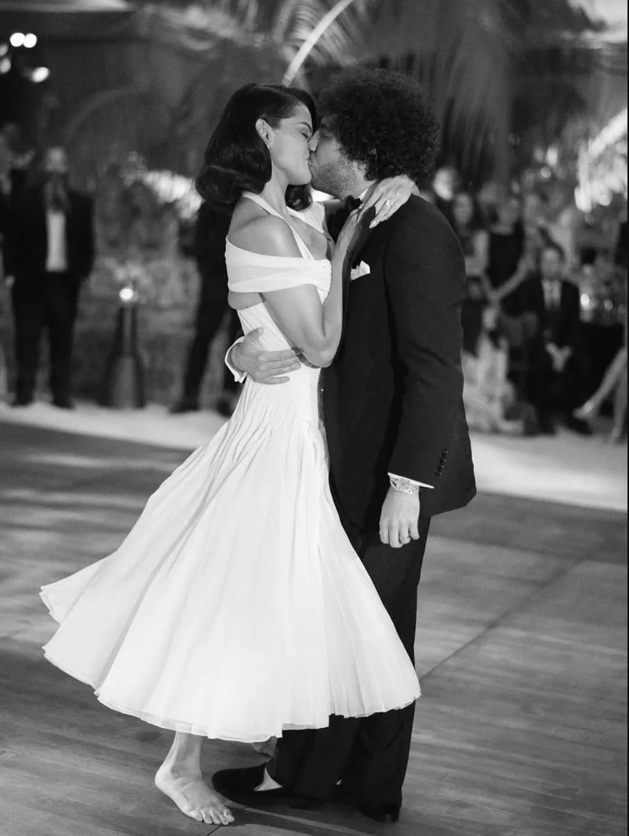 Gomez danced barefoot with her new husband, leaning in for a kiss that looked straight out of a classic black-and-white film. 

