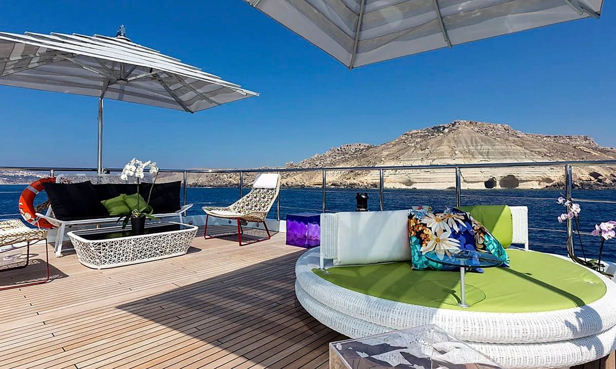The outdoor deck with round beds