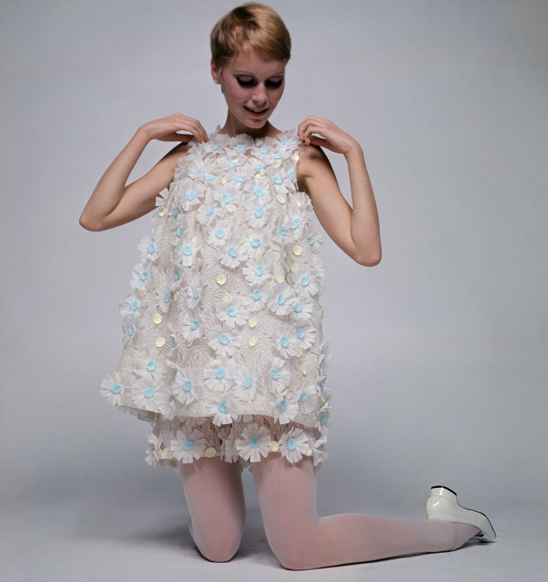 Mia Farrow wearing babydoll dress designed by Ungaro