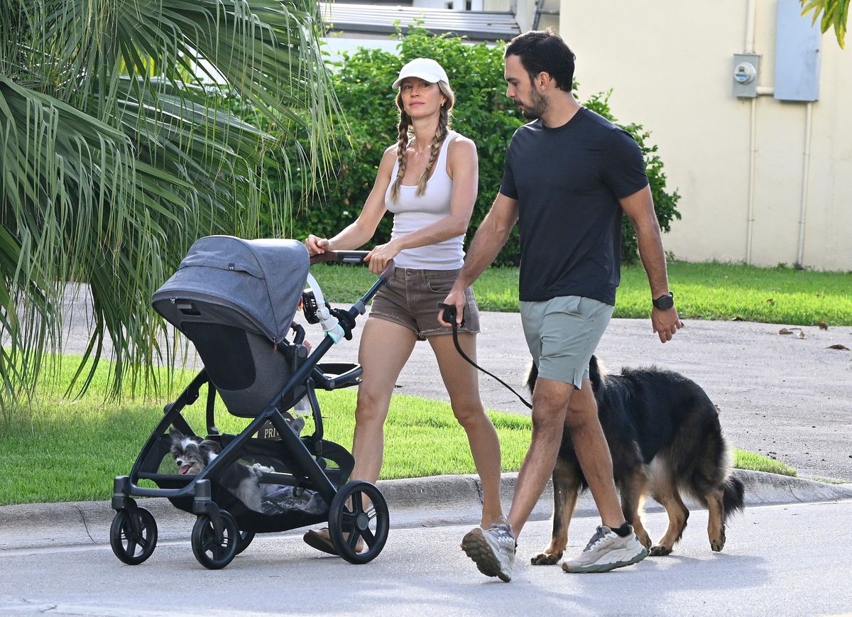 

Gisele Bündchen and her fiancé, Joaquim Valente, were spotted enjoying a relaxed stroll through their community in Surfside, Florida, with their newborn baby boy and pets in tow. Fresh from a long vacation, the couple looked happy and at ease during their outing.