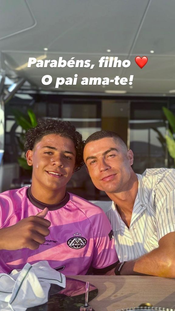 Cristiano Ronaldo celebrates his son Cristiano Jr. as Portugal begins its World Cup journey