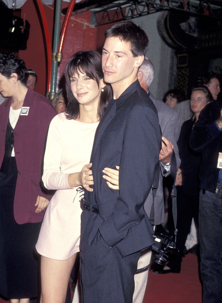 Sandra Bullock and Keanu Reeves in the 90s