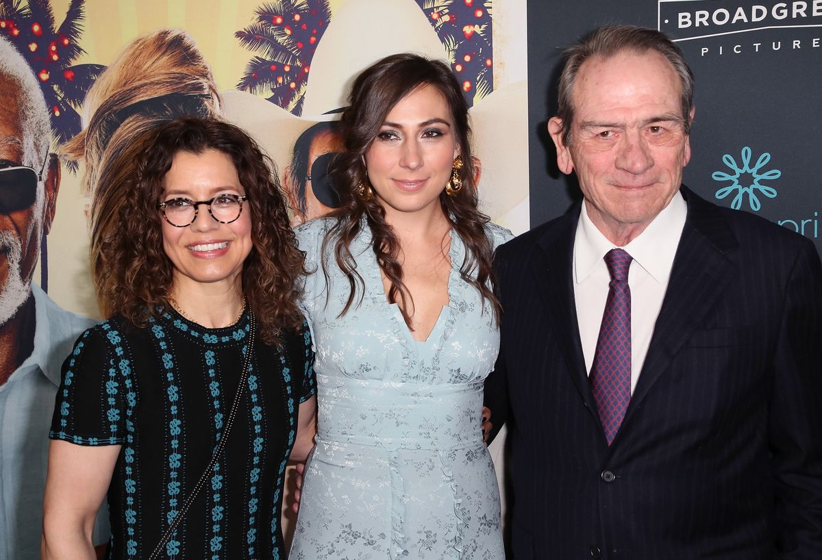 Actor Tommy Lee Jones poses with wife photographer Dawn Laurel-Jones (L) and his daughter Victoria Jones (C) at the premiere of "Just Getting Started" on December 7, 2017 in Hollywood, California.