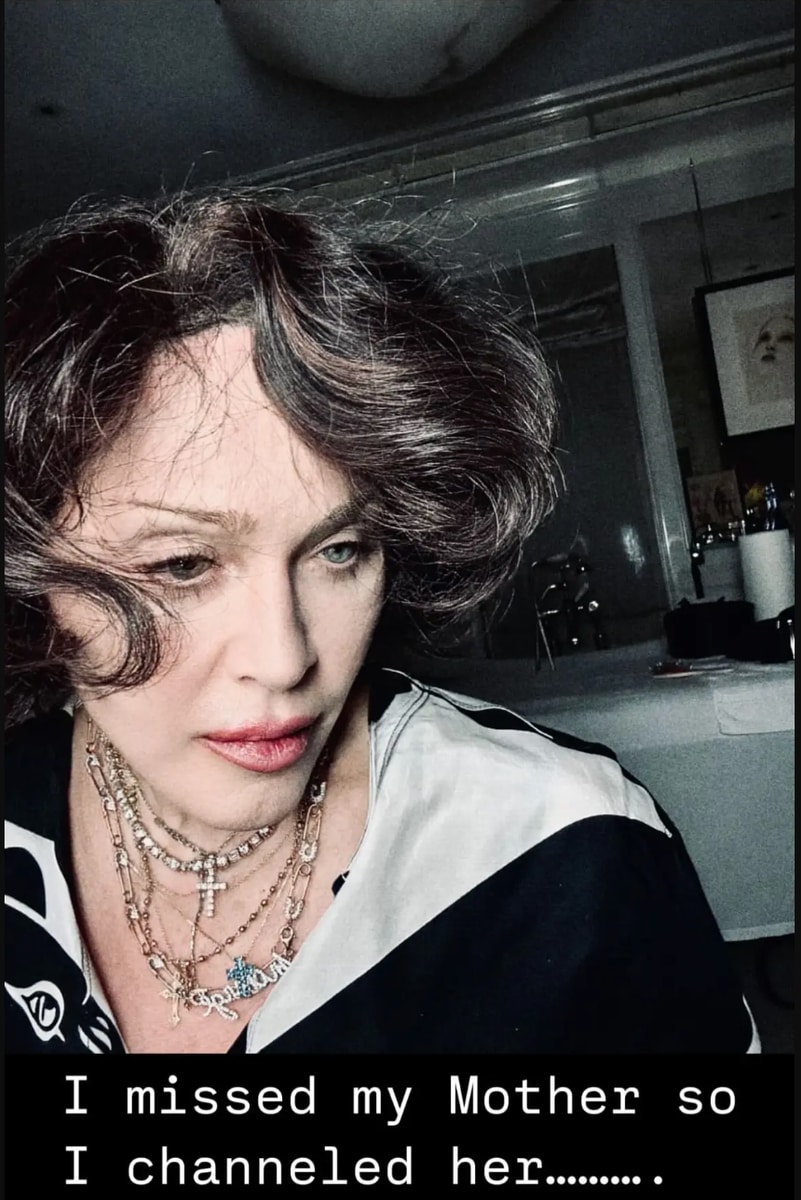 Madonna's brunette hair isn't just a look; it's a reflection.