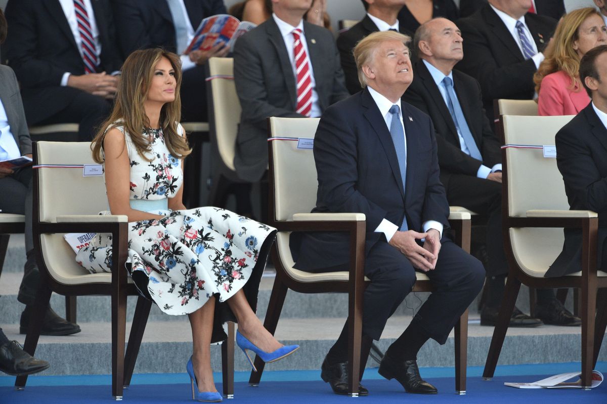 In July 2017, during a Bastille Day visit to Paris, Melania chose a floral jacquard Valentino dress to watch the military parade along the Champs-Élysées. 