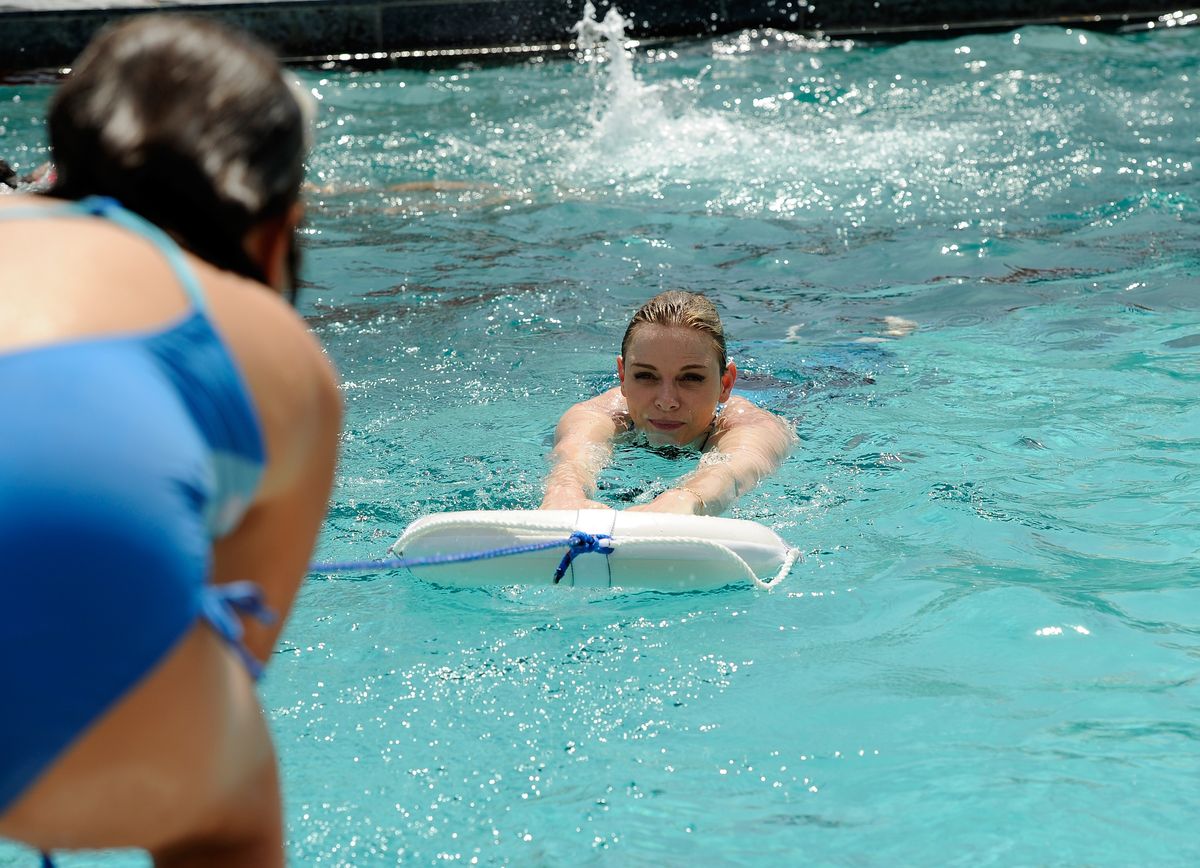 Princess Charlene teaches children essential swimming and water safety skills during the U.S. launch of the Princess Charlene of Monaco Foundation in Santa Monica in 2016.