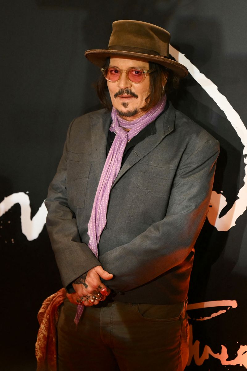 US actor and director Johnny Depp arrives at the red carpet for the avant-premiere of his new film 'Modi, Three Days on the Wing of Madness' at Cinemark in Buenos Aires.