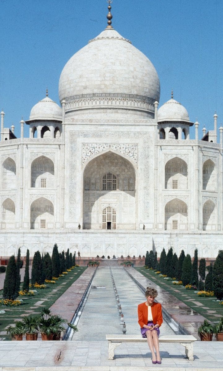 Diana, Princess of Wales poses alone at the Taj Mahal