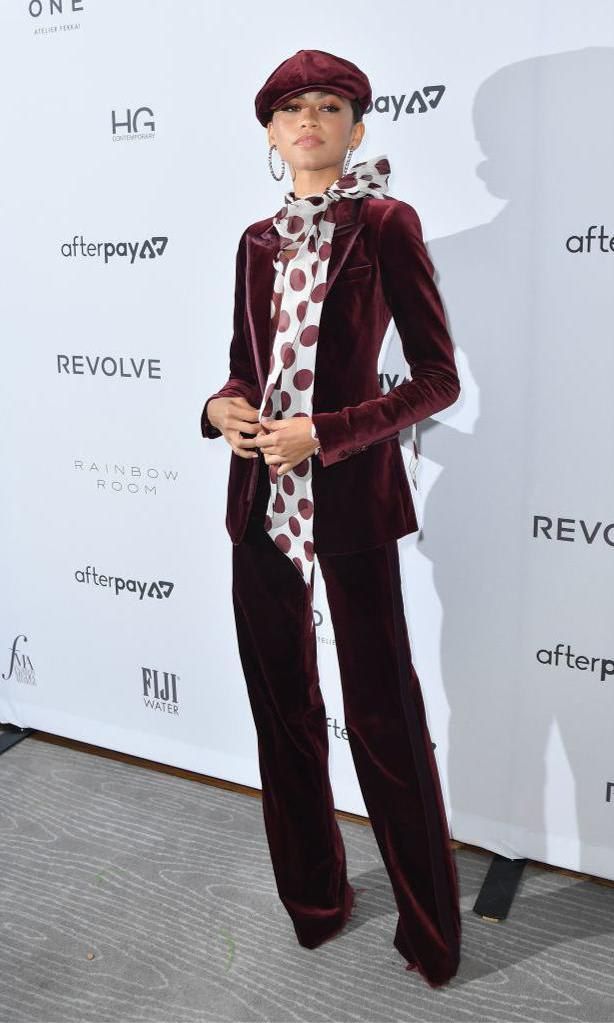 Zendaya in a velvet Tommy Hilfiger suit and polka dot blouse