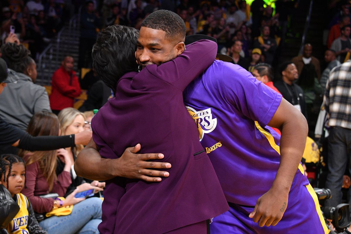 Kris Jenner hugs Tristan Thompson before a basketball game