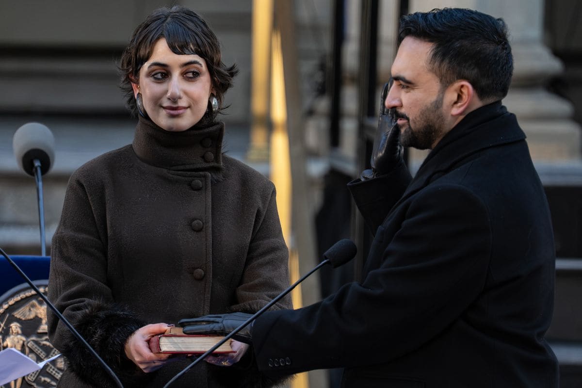 Zohran Mamdani is sworn in as New York City mayor as his wife, Rama Duwaji, looks on.